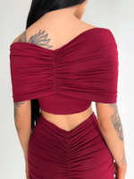 Костюм Dzhadagaevs 20112 из удлиненной юбки и топа с драпировкой