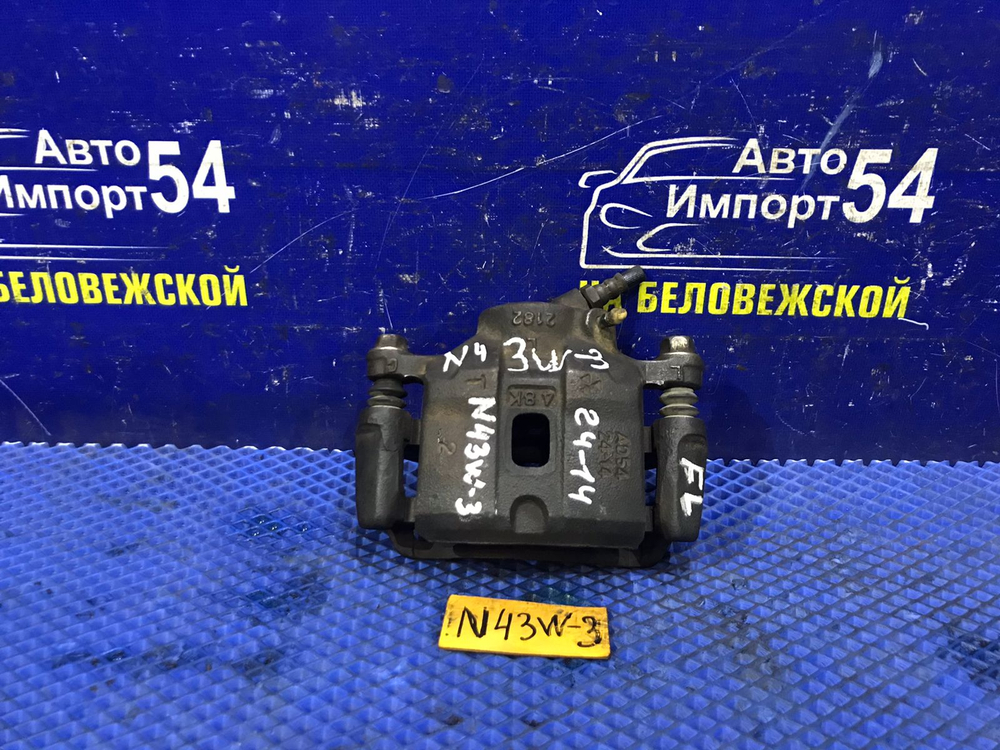 Суппорт тормозной передний левый MITSUBISHI CHARIOT 1994