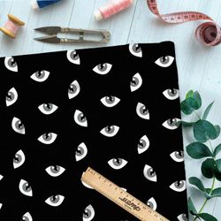 Ткань габардин серые кошачьи глаза на чёрном фоне