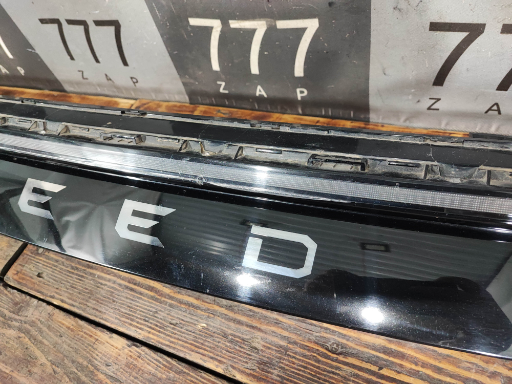 ДХО центральный подсветка логотипа Exeed RX 23-нв Б/У Оригинал 605000792AA