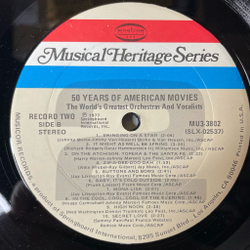 Винтажная виниловая пластинка LP Сборник Музыка Из Американских Фильмов 50 Years Of American Movies (USA 1977) (Star Wars, Gonna Fly Now, Moon River)