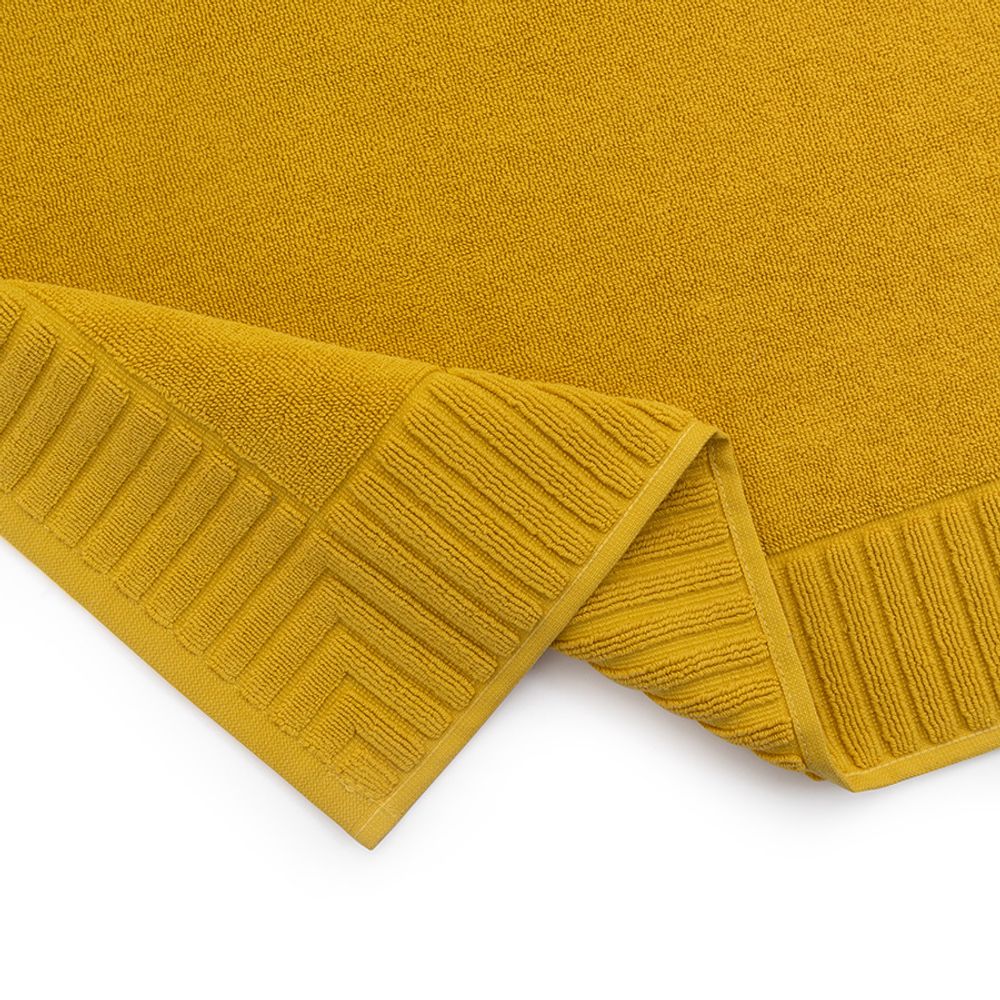 Коврик для ванной с фактурным бортиком цвета охры из коллекции Essential, 50х80 см