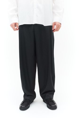 Черные брюки в полоску YOUNGMIN