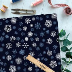 Ткань таффета белые и голубые снежинки на тёмно-синем фоне