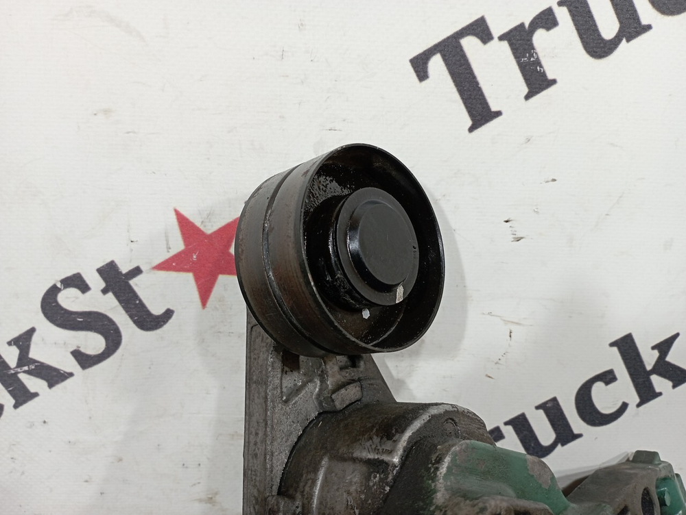 Ролик-натяжитель приводного ремня