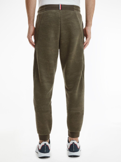 Мужские теннисные штаны Tommy Hilfiger Comfort Capsule Pant - зеленый