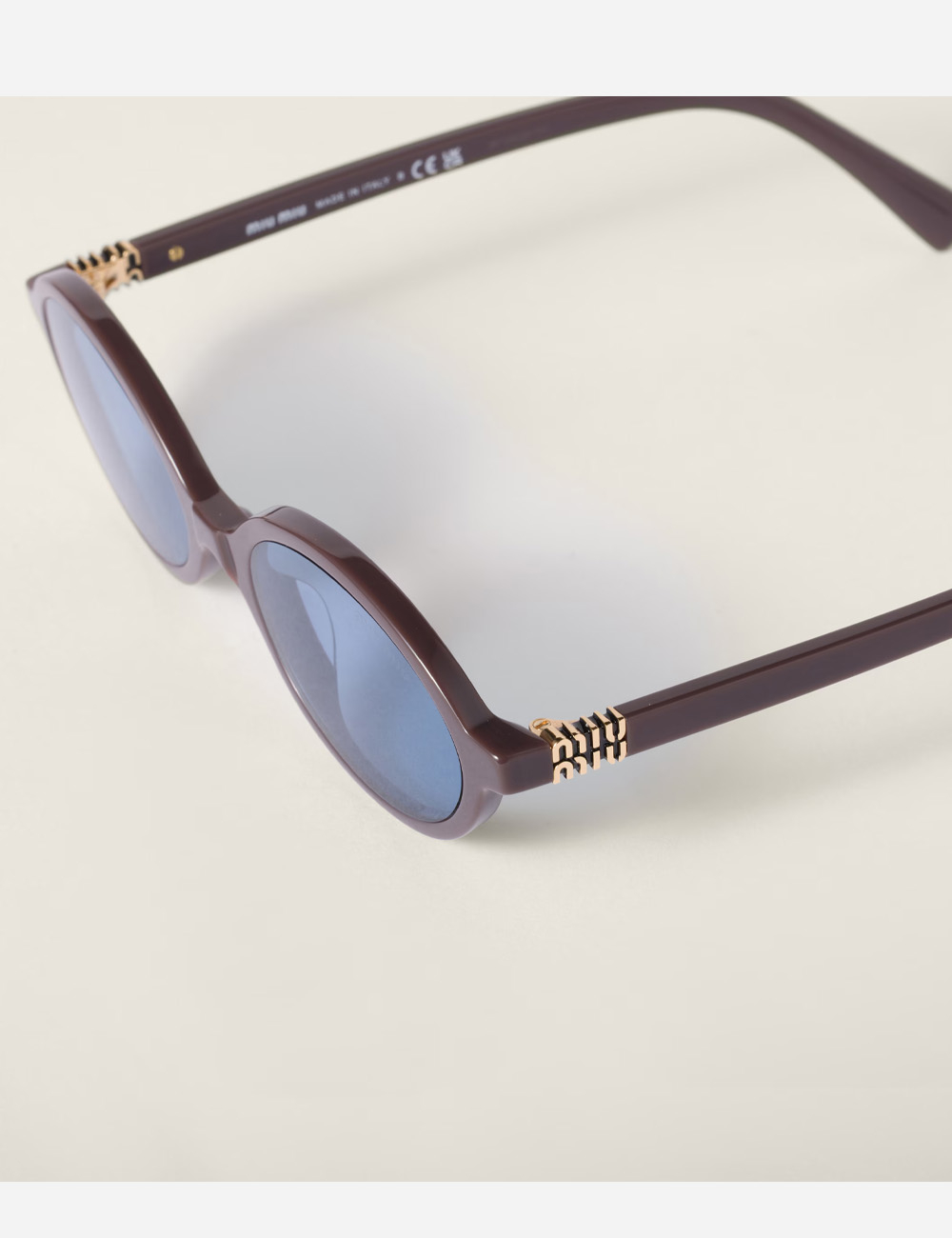 Солнцезащитные очки Miu Miu Regard Indigo lenses