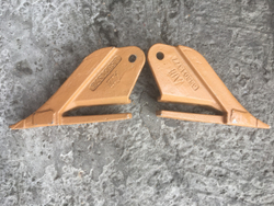 Зуб боковой левый E29 85801376