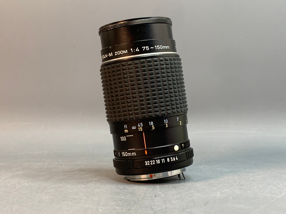 SMC Pentax-M 75–150 mm f/4 Небольшие точки внутри линзы