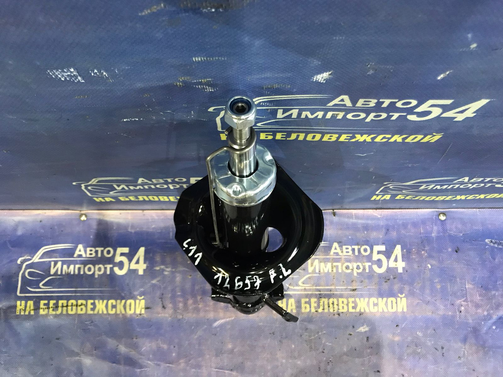 Стойка передняя левая NISSAN TIIDA 2007-2012