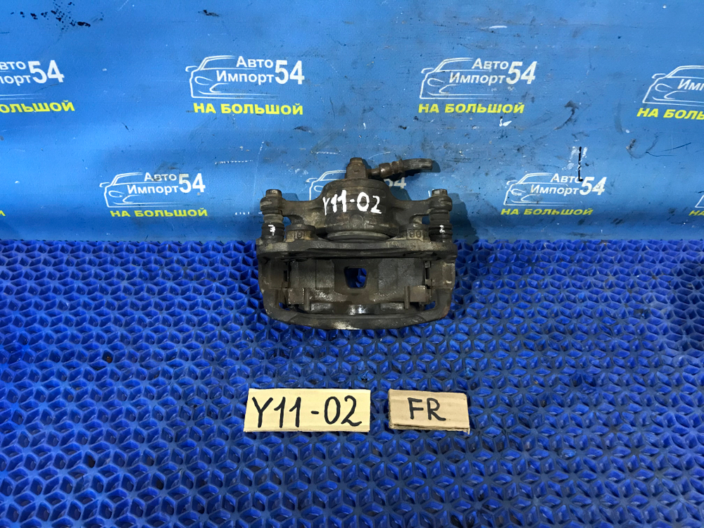 Суппорт тормозной передний правый NISSAN AD 1999