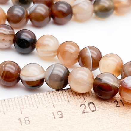 Агат тонированный кофейный, диаметр 8,1-8,3 мм, цена за 11 шт (1/4 нити)