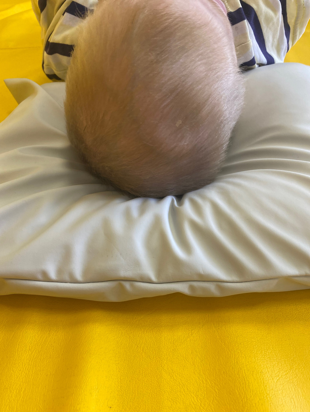Утяжеленная подушка для позиционирования головы