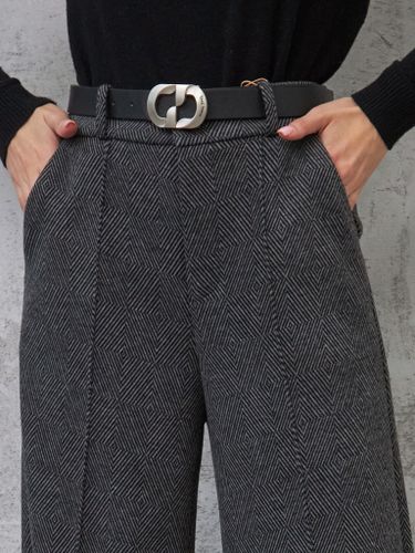Прямые брюки темно-серого цвета с узором