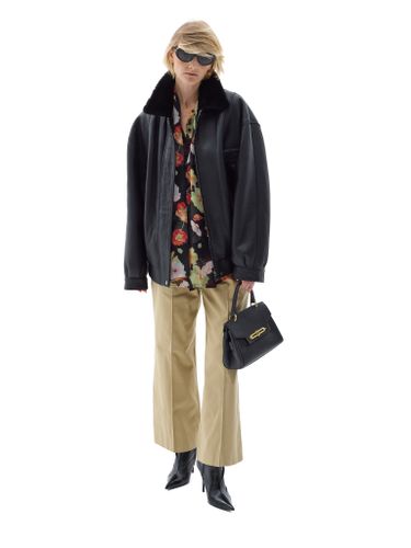 Черная кожаная оверсайз дубленка с отложным воротником