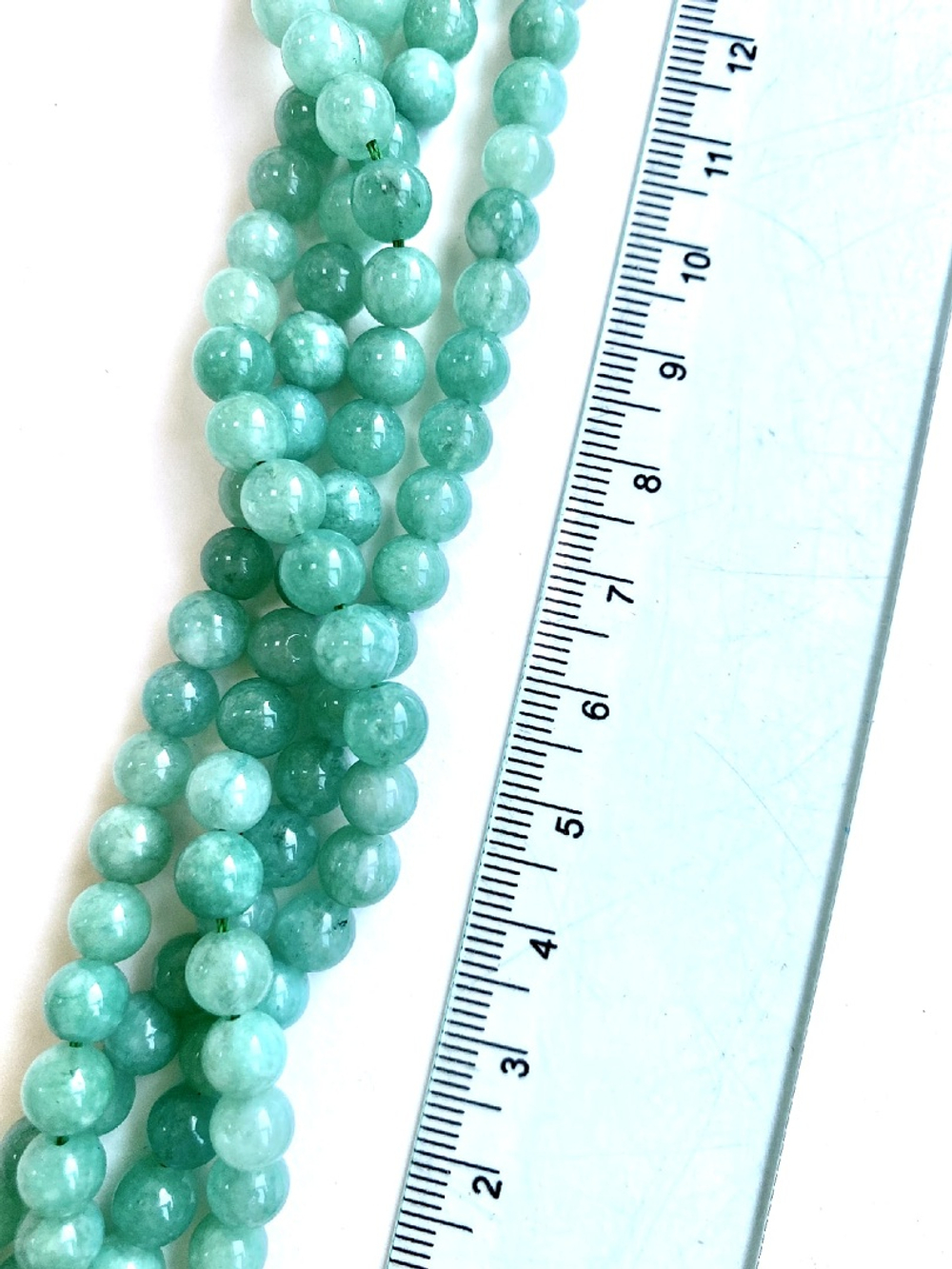 6270-р7 Кальцит шар огранка «Рубин» 7мм, нить 18,5см