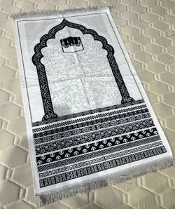 Жайнамаз Шамок