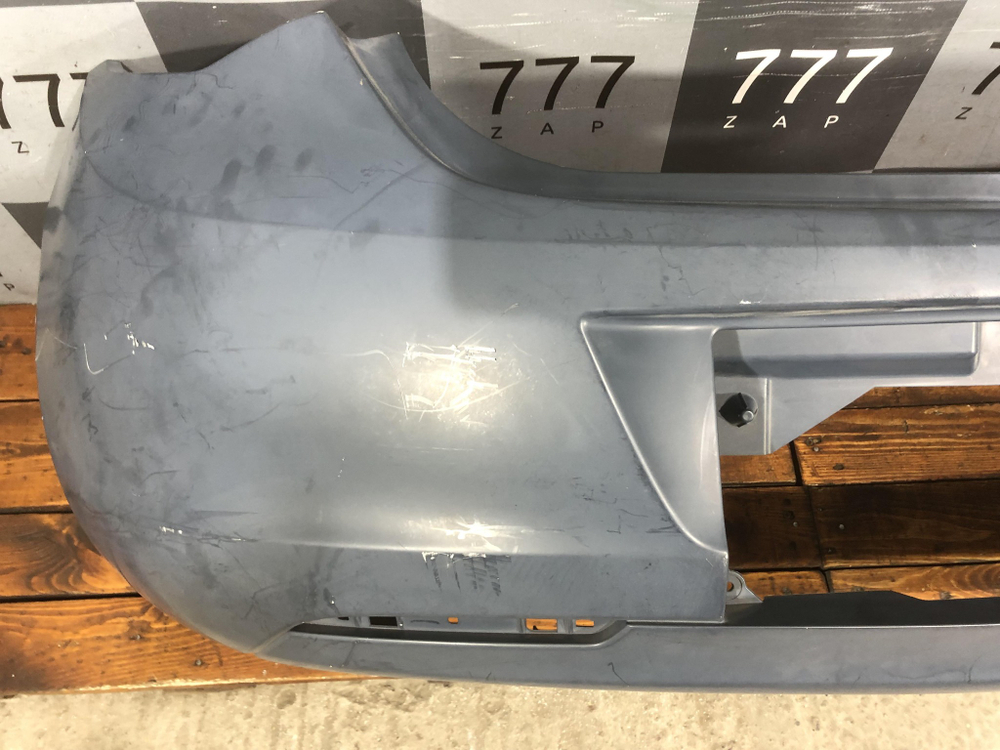 Бампер задний Opel Astra J 09-12 Новый Оригинал 13278378