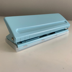 Регулируемый дырокол с 6 отверстиями