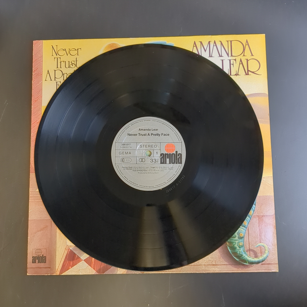 LP Amanda Lear – Never Trust A Pretty Face. Виниловая пластинка 12 дюймов. Германия