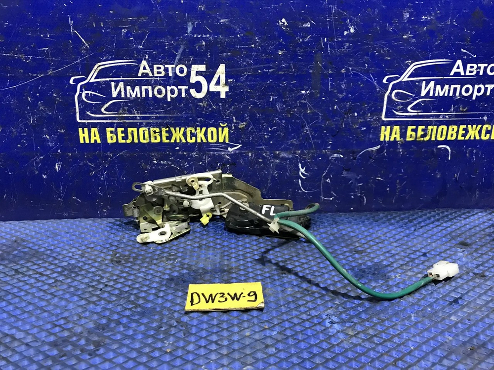 Замок двери передней левой MAZDA DEMIO 2000