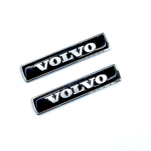 Шильд Volvo объемный металлический (наклейка Вольво, 7,5х1,5см). 2 шт в комплекте. Черный цвет с серебристой надписью