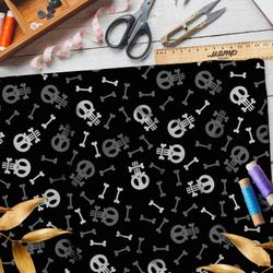 Ткань мембрана белые черепа и серые кости на чёрном фоне