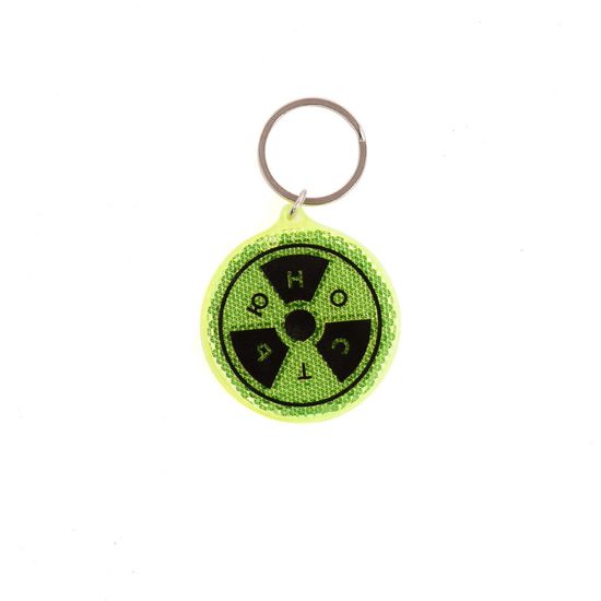 Брелок-катафот ЮНОСТЬ Радиация Зеленый
