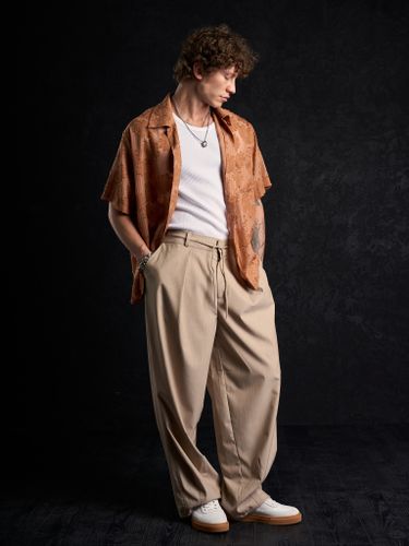 Бежевые брюки 2s1 studio в полоску