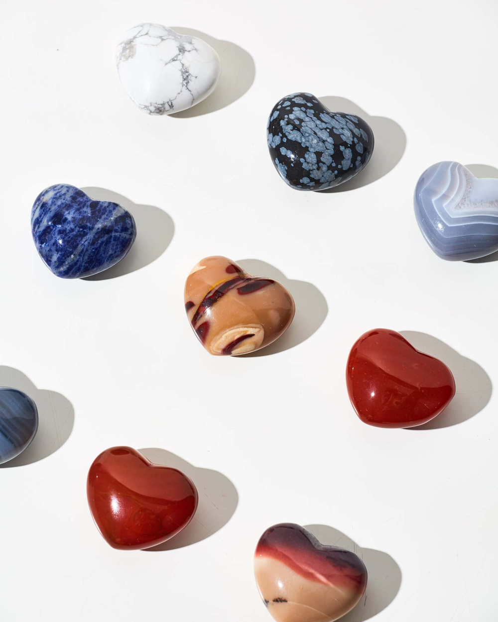 Сердечки из сердолика и горного хрусталя