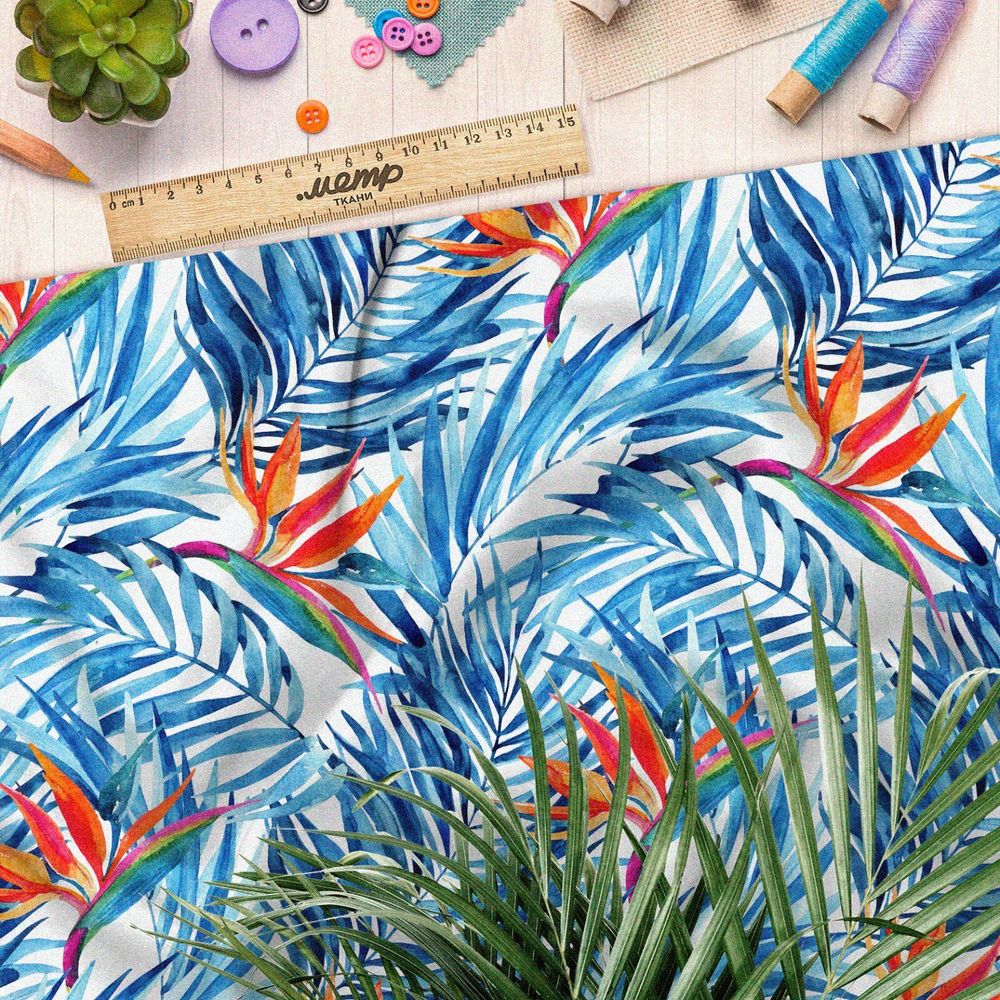 Ткань оксфорд 210 синие раскидистые листья с оранжевыми