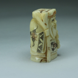 Нэцкэ Дзюродзин с посохом и кисетом