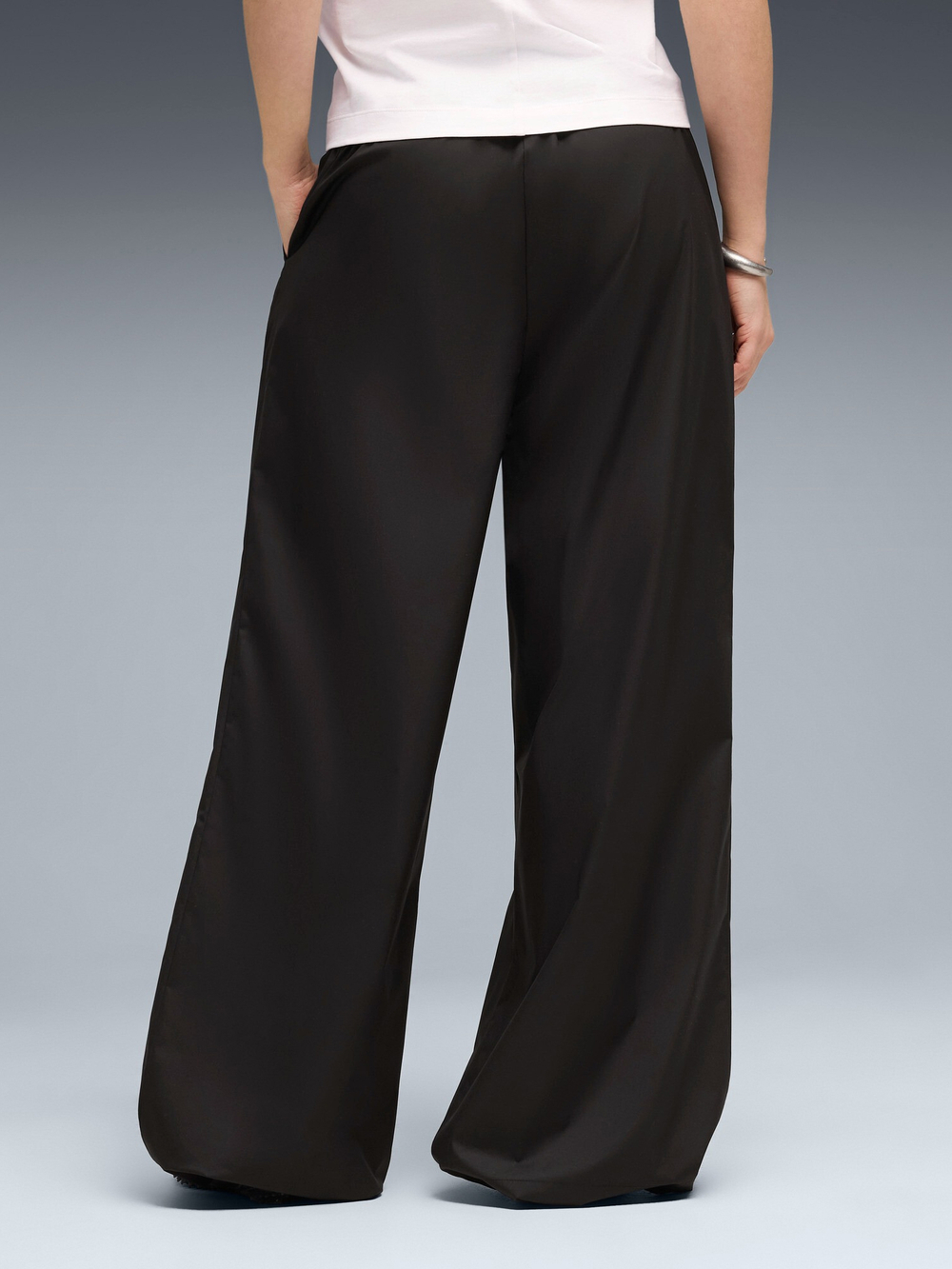 Брюки спортивные женские PUMA PUMATECH SENSE 2-Way Stretch Relaxed Windcell Woven Pants