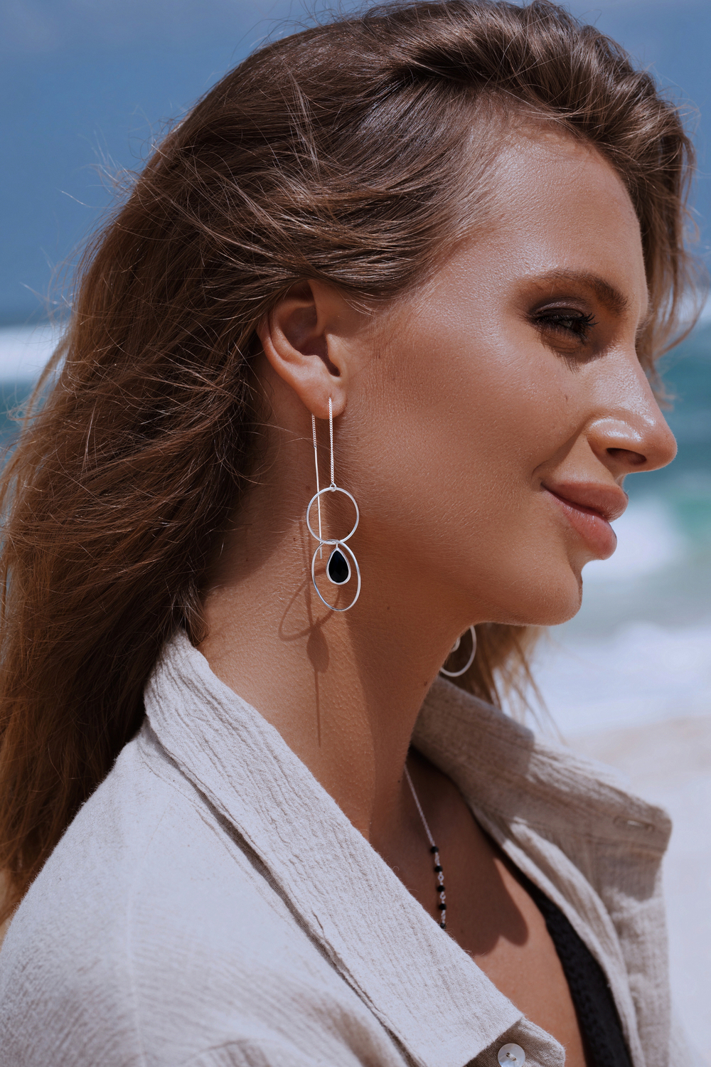 Серьги-протяжки «Сатурн» с черным ониксом