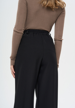 Брюки с простроченными стрелками