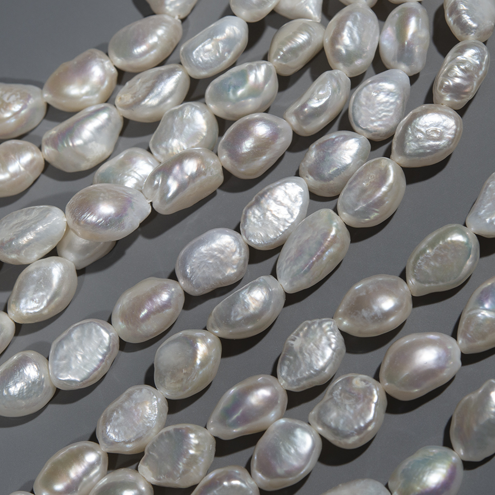 Жемчуг штучный культивированный крупный, белый, 10-15*8мм