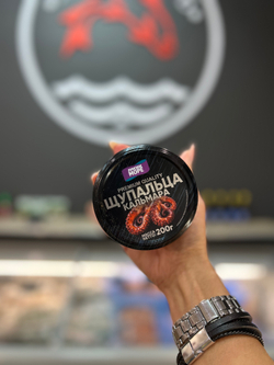 Щупальца кальмара с копченой паприкой в масле