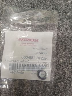 45216-166-006. WASHER, WAVE. HONDA