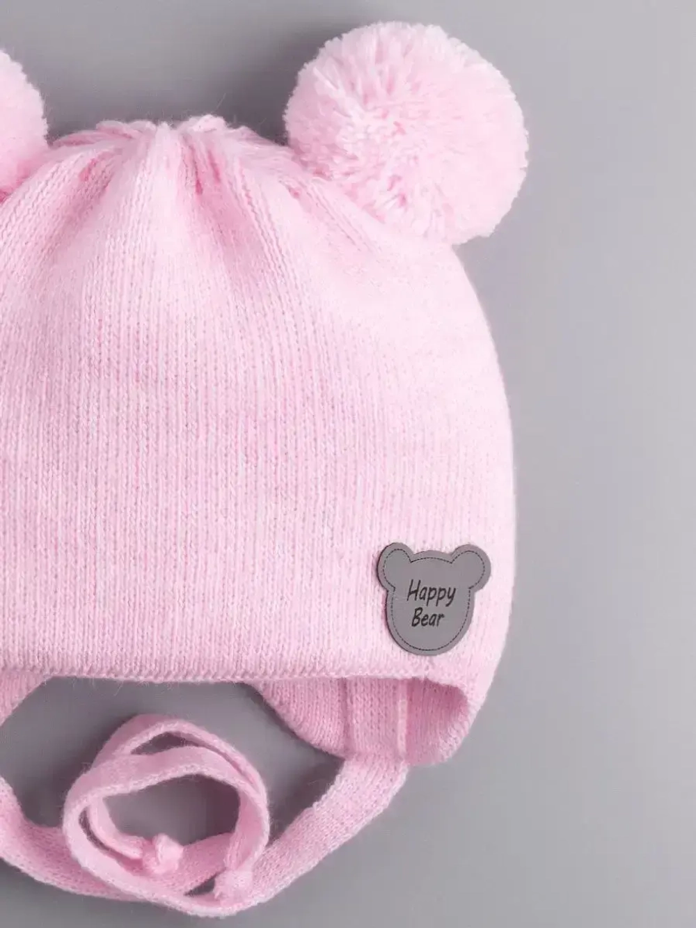 Шапка для девочки осенняя с завязками и помпонами