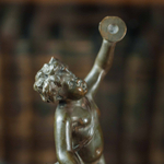 Бронзовая скульптура «Амур, играющий на цимбалах»