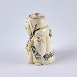 Нэцкэ Ребенок Карако с мешком риса