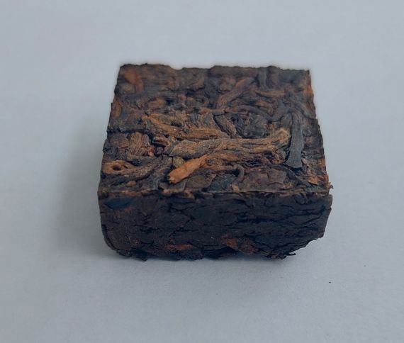 Шу пуэр 2013 г. "Вкус Номи сян" завода "Кайшуньхао" набор 60 г (9 шт. в пачке)