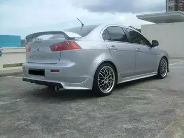 Юбка заднего бампера var.1 Zodiak для Mitsubishi Lancer 10