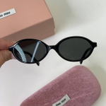 Солнцезащитные очки MIU MIU
