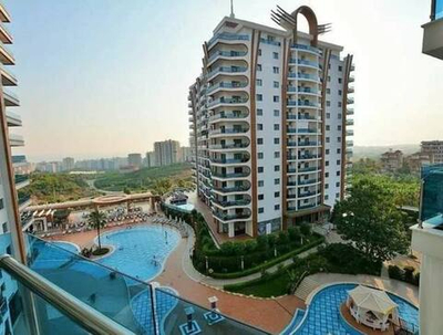 ЖК "AZURA PARK RESIDENCE" Турция, Аланья, район Махмутлар. Жилой комплекс - это не просто квартира, это билет в беззаботную жизнь уровня премиум-класса, где инфраструктура затмевает многие пятизвездочные отели