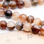 Агат тонированный кофейный, диаметр 8,2-8,3 мм, цена за 22-23 шт (1/2 нити)