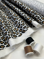 Хлопок с эластаном белый с черно-коричневым анималистичным принтом