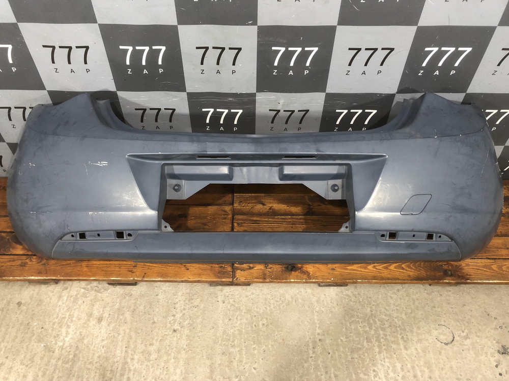 Бампер задний Opel Astra J 09-12 Новый Оригинал 13278378