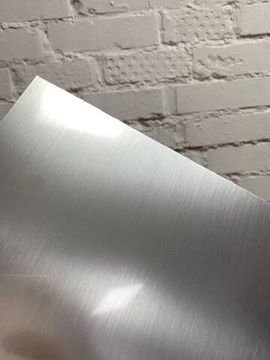 Пластик для гравировировки Laser 1,5х600х1200мм, серебро царапанное/черный