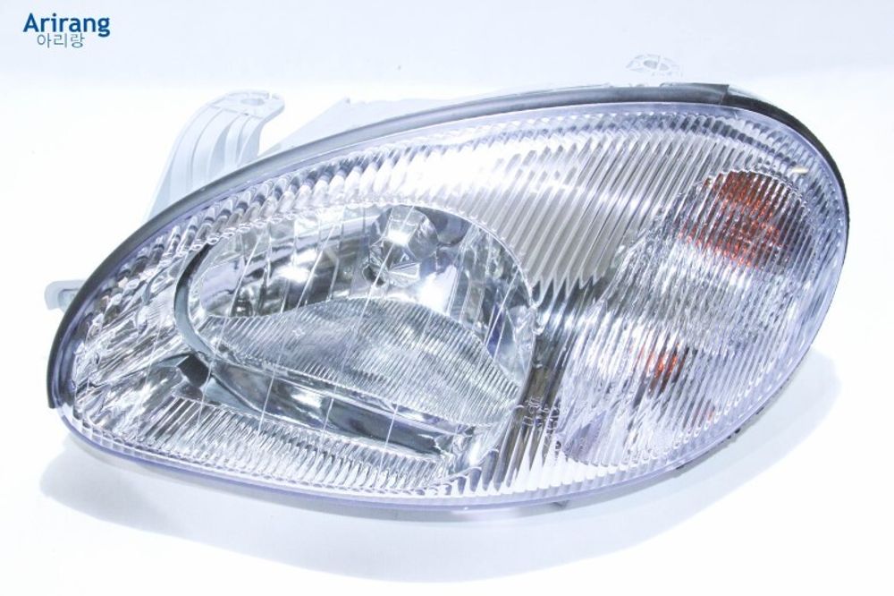 Фара Chevrolet Lanos лев. /под эл. корр./ (ARIRANG)